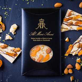 White chocolate with dried apricots, roasted almonds and lemon zest