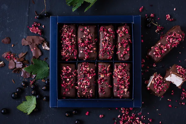 Black currant marshmallow covered in dark chocolate